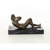 An erotic bronze sculpture of a reclining male nude