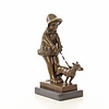 Bronzen sculptuur van een meisje met hond