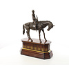 Bronze sculpture of jockey on racehorse