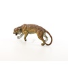 Bronze sculpture of a prowling tiger