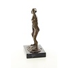 Bronzen beeld van een intens staand mannelijk naakt
