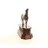 Bronze sculpture of a trotting horse