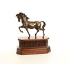 Bronze sculpture of a trotting horse