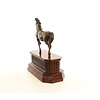 Bronze sculpture of a trotting horse