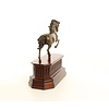 Bronze sculpture of a trotting horse