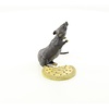 Bronze sculpture of a mouse eating a biscuit