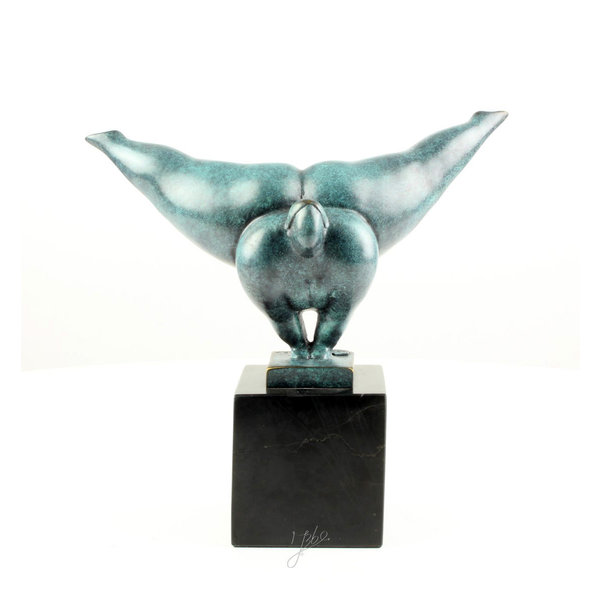  A modern bronze sculpture of a voluptuous gymnast