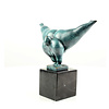 A modern bronze sculpture of a voluptuous gymnast