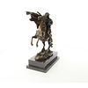 A bronze sculpture of Napoleon crossing the Alps