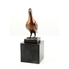 Bronze sculpture of a standing pigeon