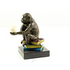 Bronze sculpture of Darwin's philosophising ape