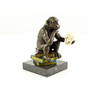 Bronze sculpture of Darwin's philosophising ape