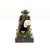 Bronze sculpture of Darwin's philosophising ape