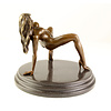 Bronze sculpture of an erotic female nude