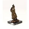 Bronze sculpture of a female rabbit holding her bunny