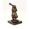 Bronze sculpture of a female rabbit holding her bunny