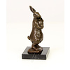 Bronze sculpture of a female rabbit holding her bunny