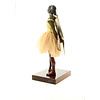 A Cold-painted bronze sculpture of the little dancer by Degas