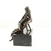 Bronze sculpture of a threesome having sex