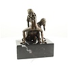 Bronze sculpture of a threesome having sex