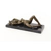 An erotic bronze sculpture of a reclining female nude