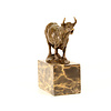 Bronze sculpture of a bellowing  bull mounted on a marble base