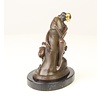 Bronze sculpture of a woman embracing a phallus