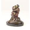 Bronze sculpture of a woman embracing a phallus