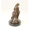 Bronze sculpture of a woman embracing a phallus