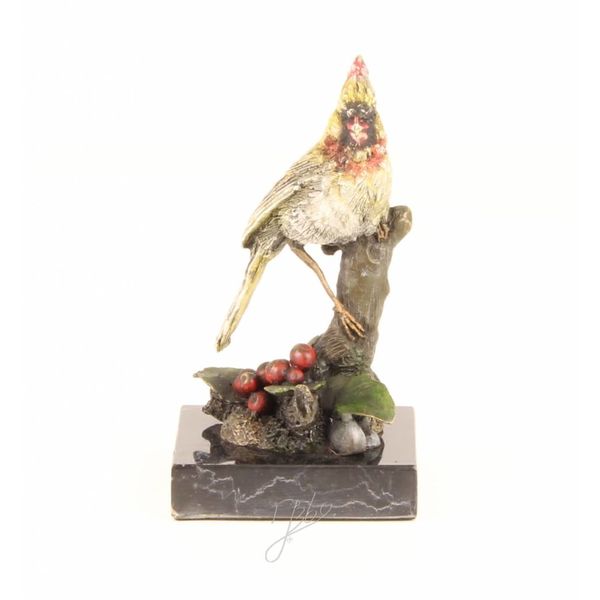  Bronze sculpture of a cardinal bird sitting on a branch
