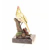 Bronze sculpture of a cardinal bird sitting on a branch