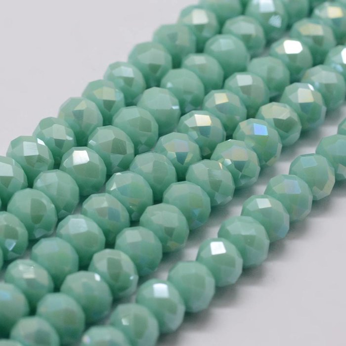 157* Faceted Glassbeads Light Turquoise 6x4mm, strand 85 pieces