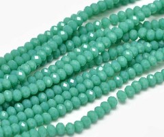 Faceted Glassbeads Deep Green 3.5x2.5mm, strand 120 pieces