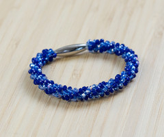 Kumihimo bracelet with faceted beads