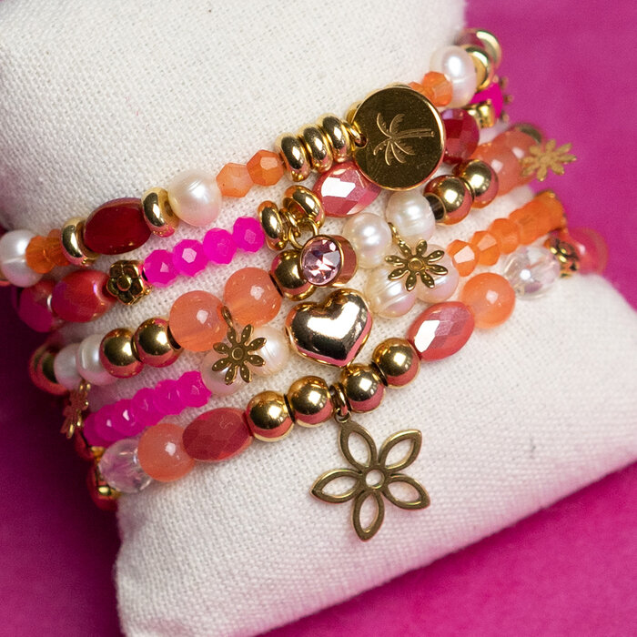 Orange and Pink Bracelets of Beads and Charms