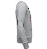 Local Fanatic Panther - Strass Sweater - Grau