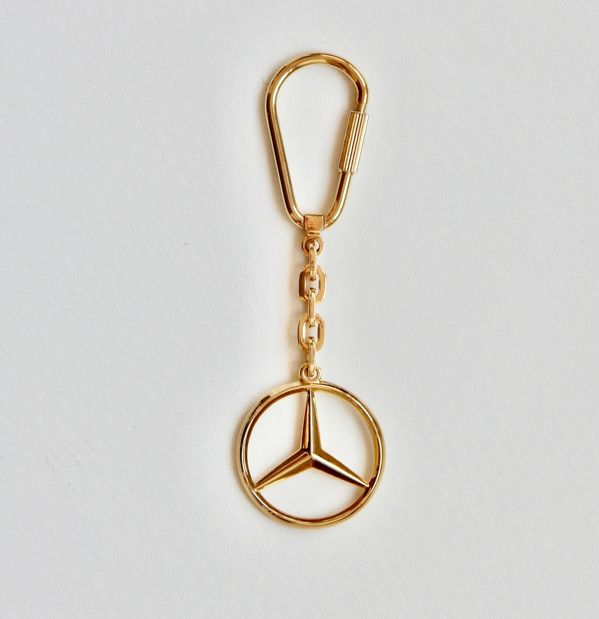 Sleutelhanger van Mercedes-Benz in 14 krt. geelgoud, 93 mm lang