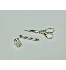 Naaigarnituur in zilver, driedelig