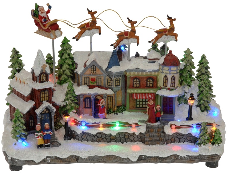 Kersttafereel met bewegende arreslee