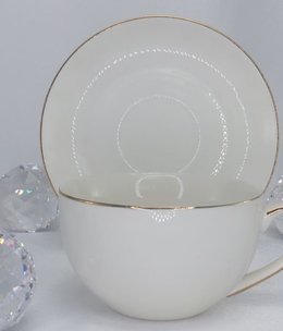 CARMANI - 1990 Teacup with saucer- white / gold