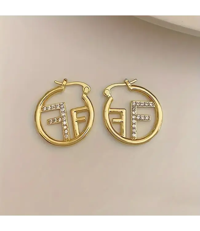 Vintage gouden oorbellen FF met steentjes