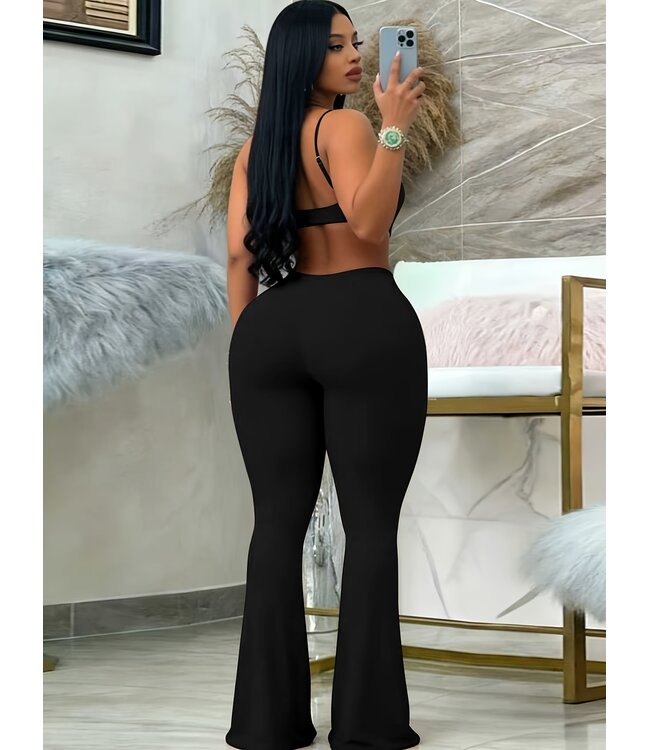 Luxe jumpsuit met cut out en buckle - zwart