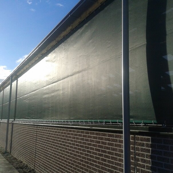 Staldoek voor minder wind