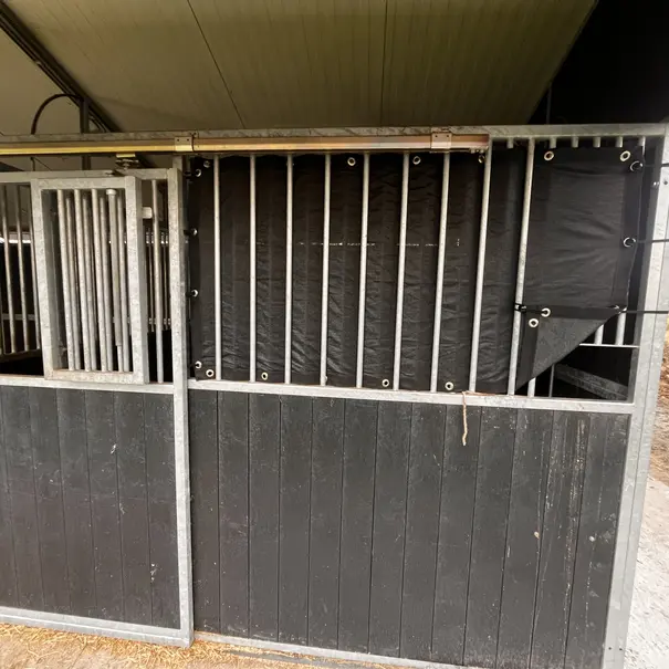 Staldoek voor minder wind