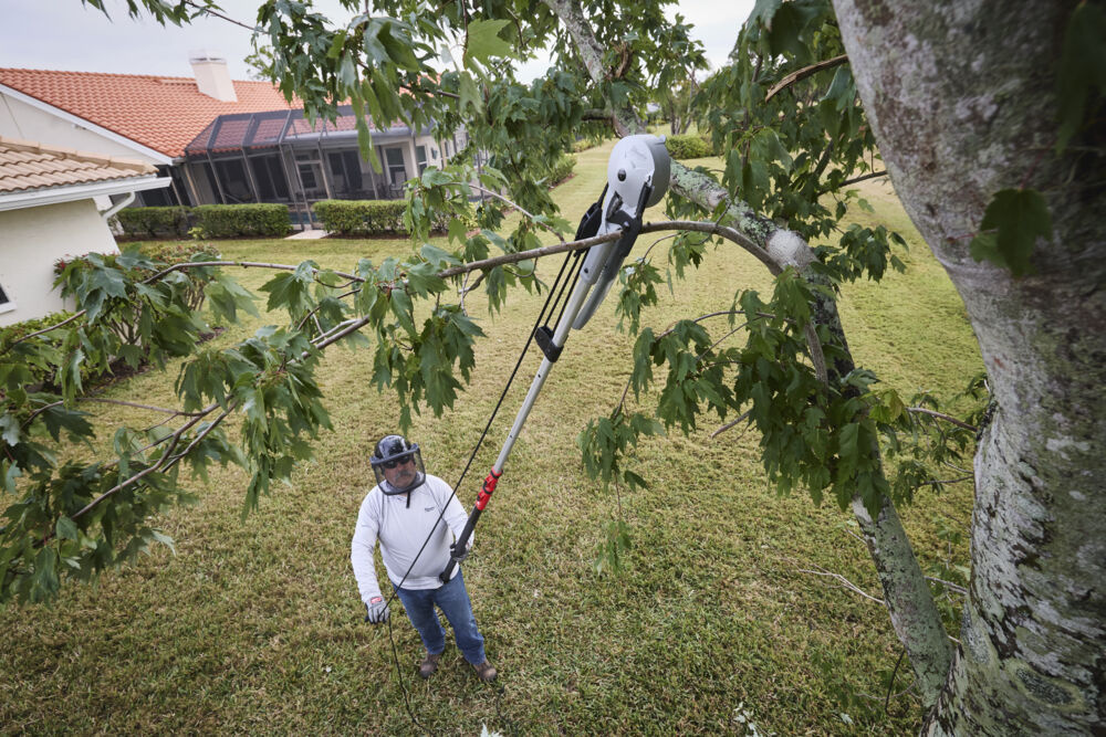 MILWAUKEE Telescopische takkenschaar met zaag