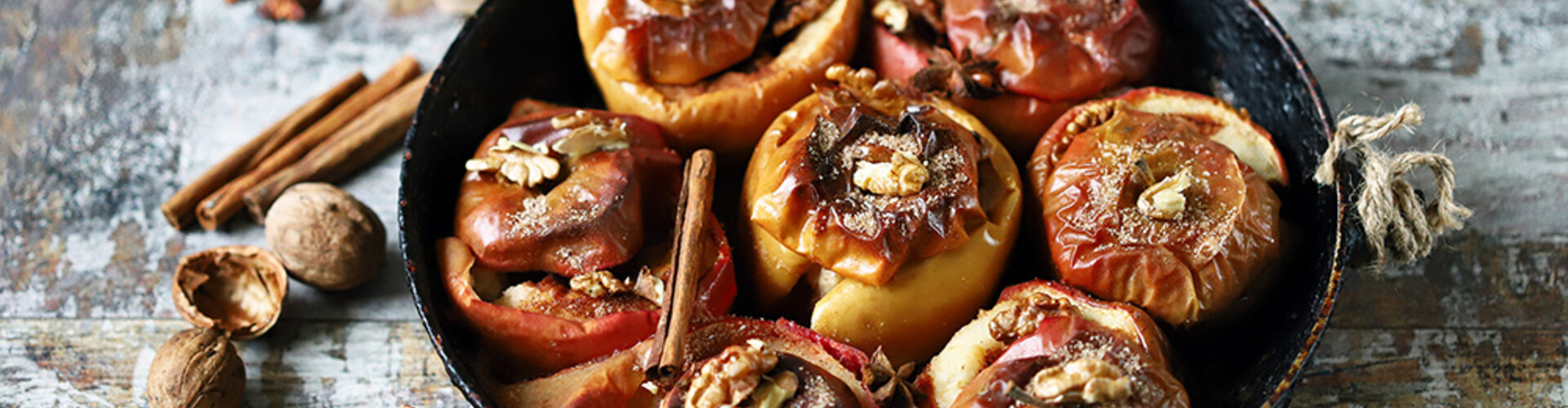 Baked apple with walnuts, cinnamon and honey