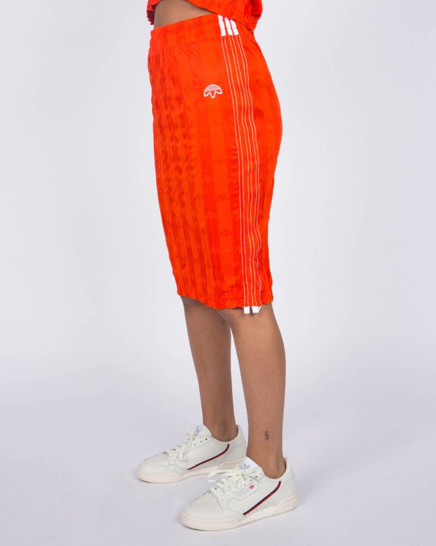 orange and white adidas tracksuit