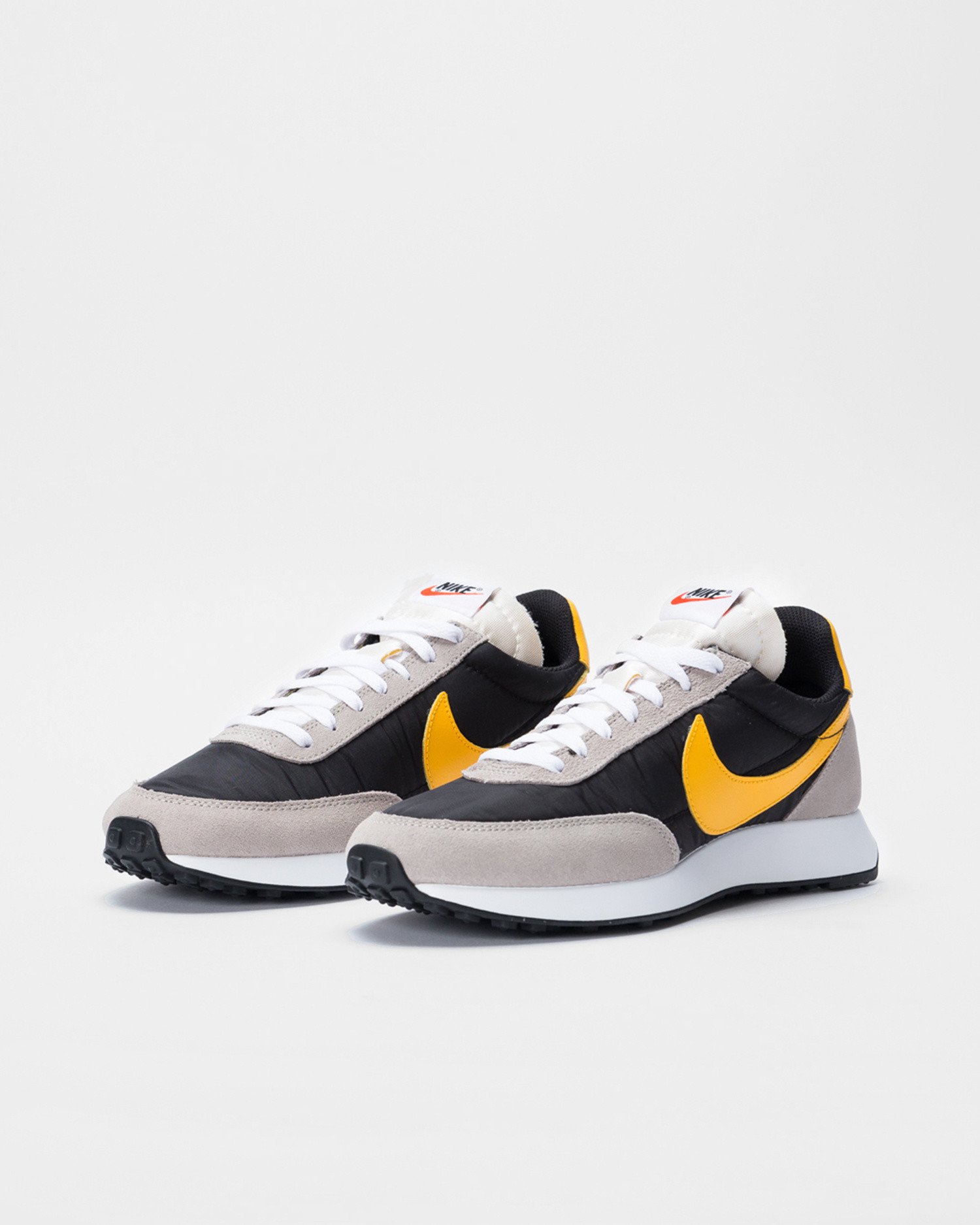 nike tailwind 79 university gold