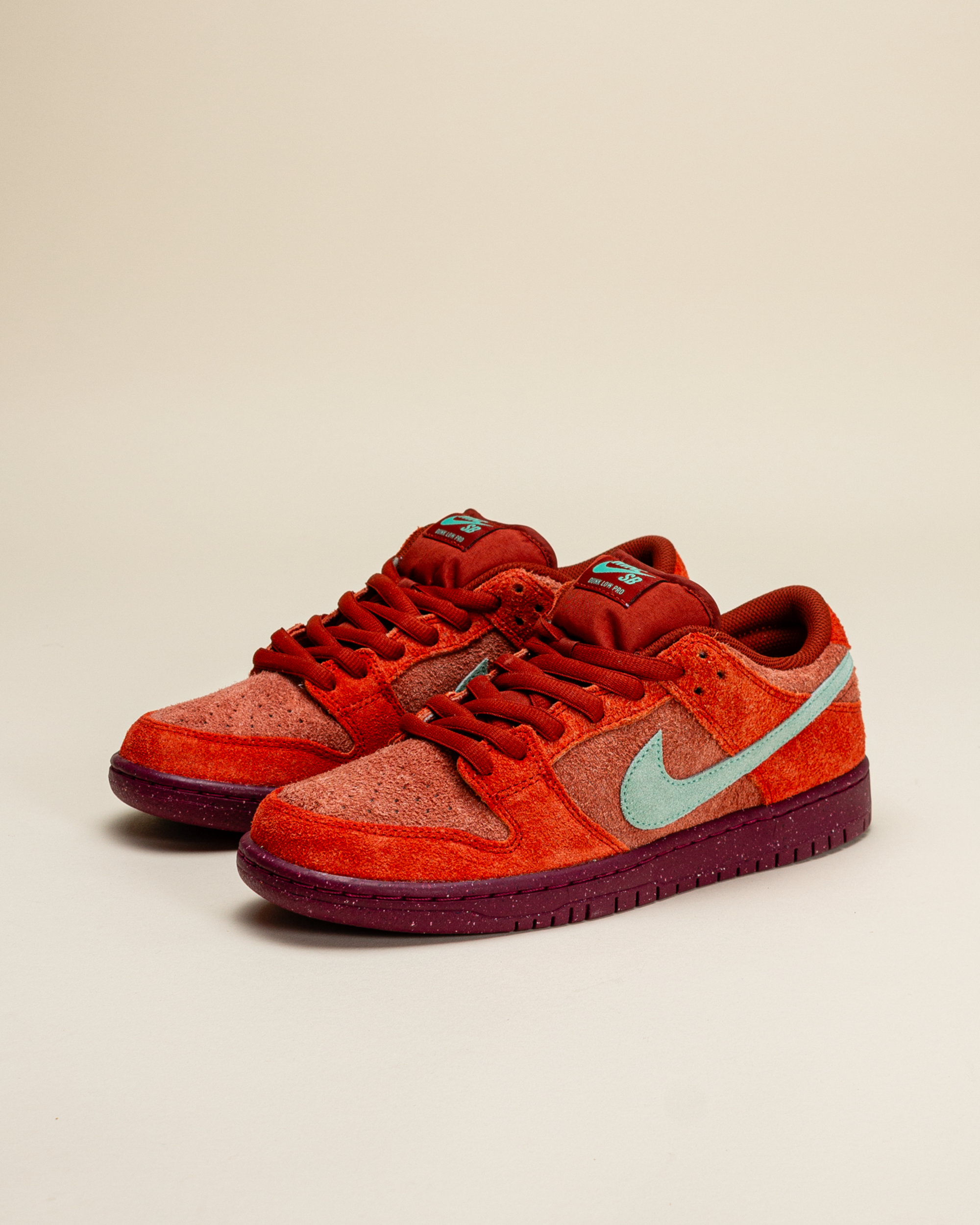 Shop Nike SB Dunk Low Pro Premium Shoes (mystic red emerald rise) online