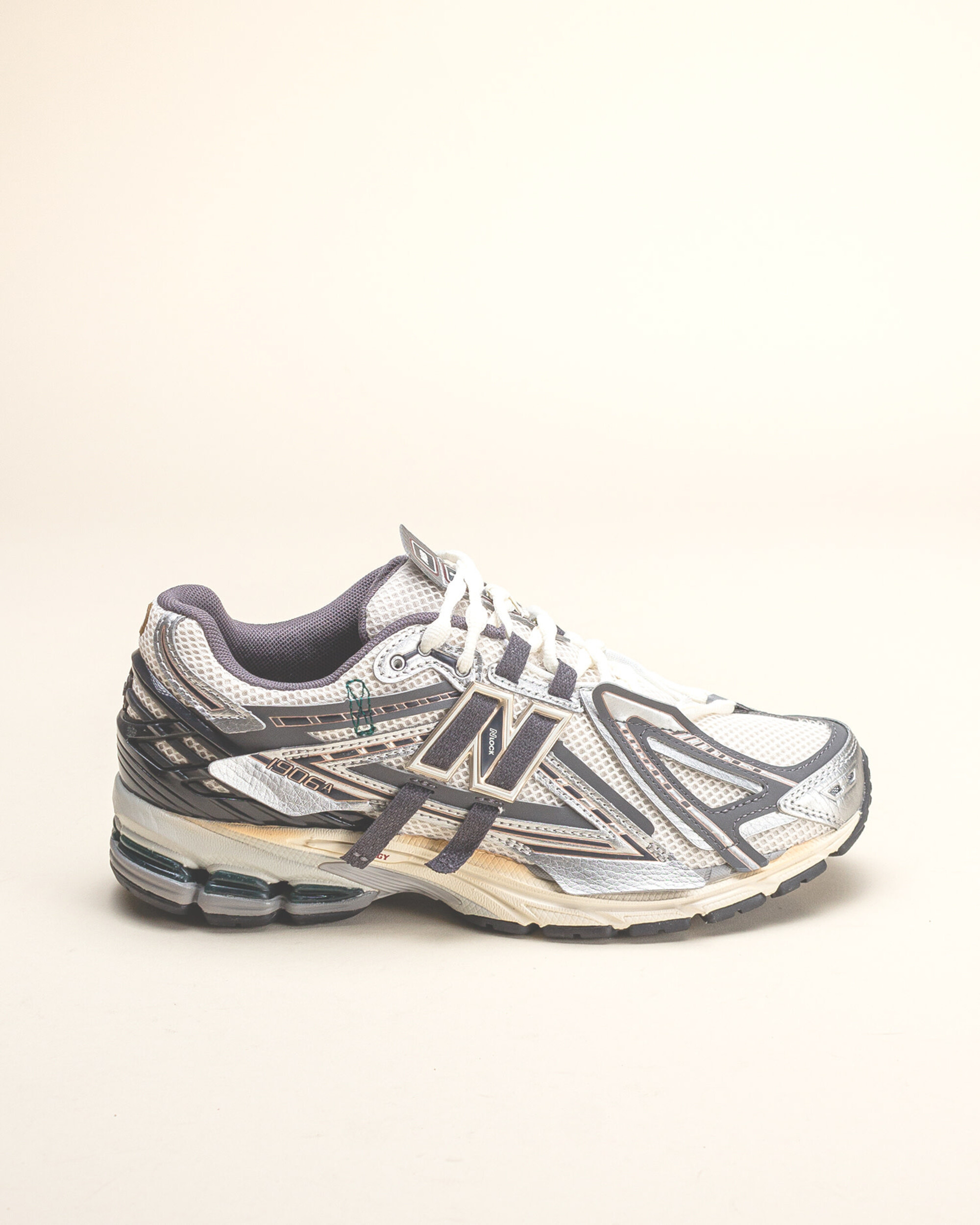 New Balance 1906A - Silver Metallic / Castlerock / Gold Metallic